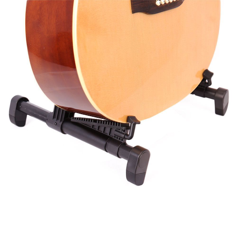 large string instrument played with fingers large string instrument played with fingers